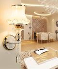 Modern Minimalist Wall Sconce Packed With Clean Lines And Iron Construction, stylish wall lamp with glass shade and crystal detail.