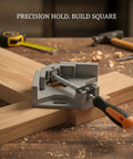 Hefty Heavy Duty Single Handle Right Angle Clamp Locks Metal And Wood At Precise 90 Degrees on wooden surface for assembly projects.