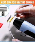 Close-up of Resin Heat Gun For Crafting, 350W Dual Temp Hot Air Gun With Fast Heat, showing nozzle and silicone cover in use