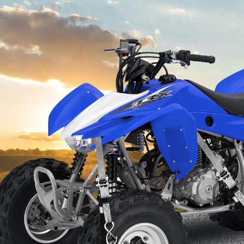 Heavy Duty Ratchet Tie Down Straps 15 Foot 4 Pack Featuring Tough As Nails Grip With 2200 Pound Break Strength to secure a blue ATV at sunset.