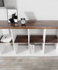 Top view of a console table with books and decor, showcasing Wood Grain Contact Paper 30x200 Inch Roll Peel And Stick Self Adhesive Wallpaper