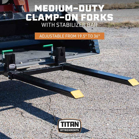 Medium-duty clamp-on pallet forks with stabilizer bar on loader bucket, adjustable from 19.5 to 36 inches, 4,000 lb capacity.