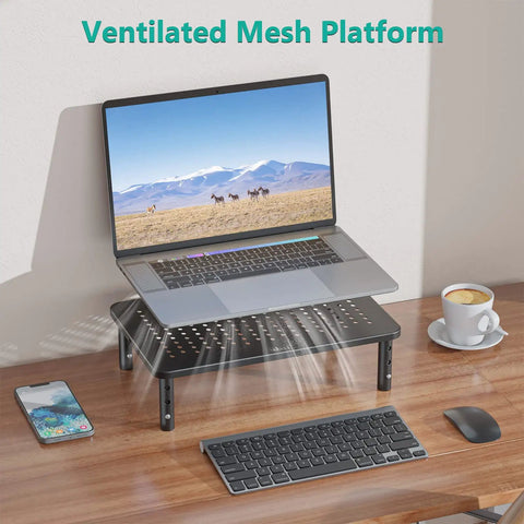Go To Adjustable Desk Monitor Stand With Laptop Riser And Under Desk Storage, black metal frame holding a laptop on a wooden desk.