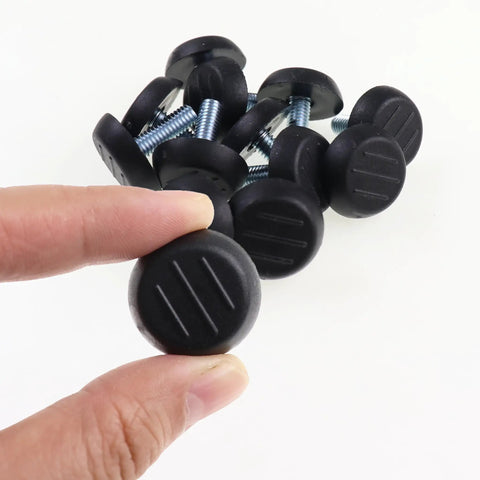 Set Of Twelve Adjustable Furniture Levelers With 1/4 20 Unc Thread Table Feet And Chair Glides To Fix Wobbly Legs In No Sweat Fashion For A Butter Smooth Ride And Zero Wobble Everyday, showing black rubber feet and metal screws.