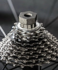 Chain Whip And Cassette Lockring Tool Kit For 7 8 9 10 11 12 Speed Shimano And Sram close-up on bike cassette with lockring nut