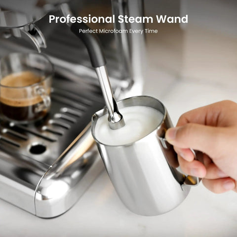 Game Changing Espresso Machine With Built In Grinder And 20 Bar Pressure, Hassle Free Milk Frother For Rich Cappuccinos, Stainless Steel Home Brewer That Truly Slaps And Saves Space, stainless steel steam wand creating microfoam.
