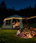 Family Cabin Tent For 6-8 With Porch And 2 Rooms, Waterproof Glamping Tent, 3 Doors, Tall And Spacious set up at night in a field