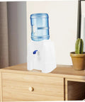 Compact Countertop Cold Water Dispenser For Home And Office With Anti Slip Base Bottled Water Compatible Great For Tea And Juice No Fuss Easy Setup Everyday Use Perfect For Camping on wooden table