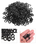 Three Wave Compression Spring Washers Set 500 Pieces In Spring Steel For Screws And Bolts, Heavy Duty Industrial Fastener Kit For Mechanical Assembly, Gaskets And Deflection Friendly Washers; black wave washers pile and hand view