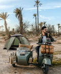 Man with motorcycle parked near 2 Person Ultralight Backpacking Tent For Camping With Waterproof Windproof Build Two Doors Easy Quick Setup Lightweight Instant Tent For 3 Season Outdoor Hiking And Backcountry Trips in desert landscape