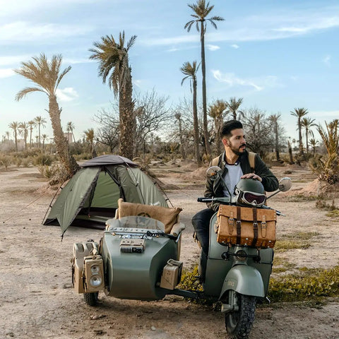 Man with motorcycle parked near 2 Person Ultralight Backpacking Tent For Camping With Waterproof Windproof Build Two Doors Easy Quick Setup Lightweight Instant Tent For 3 Season Outdoor Hiking And Backcountry Trips in desert landscape