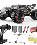 DEERC 209E 1:10 Scale Brushless RC Car 60 KMH shown with remote, batteries, and spare parts