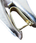 Close-up of a brass clip being fastened, part of the Numbered Brass Jiffy Wing Bands For Poultry USA Made 100 Count No Fuss Clip On