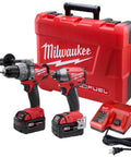 Heavy Duty Cordless Hammer Drill And Impact Driver Combo Kit Built Tough For Ripping Through Concrete Masonry And Metal, includes battery and charger.