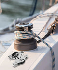 Stainless Steel Pulley Wheels 2 Pack For Kayaks And Canoes on a boat deck with rope, showcasing durable marine hardware