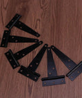 12 Pack 4 Inch Black Iron T Shape Door Hinges Heavy Duty Gate Hinges With Six Screw Holes Quick Dismantle And Easy To Install For Hotels And Clubs Built Tough For Wooden Doors arranged on floor