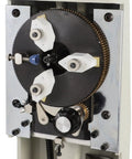 Close-up view of the engraving mechanism of the Slick Heavy Duty Ring Inner Engraver Stamper with Adjustable Letter Dial Tool for Jewelers.