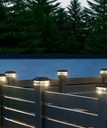 Weather Proof Fence Post Solar Lights For Backyard And Driveway Lines on fence posts illuminating a deck in evening light.