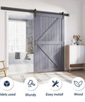 Gray Wood Barn Door Slab 48 By 84 Inches With 8 Foot Barn Door Hardware Track Kit Installed in Room