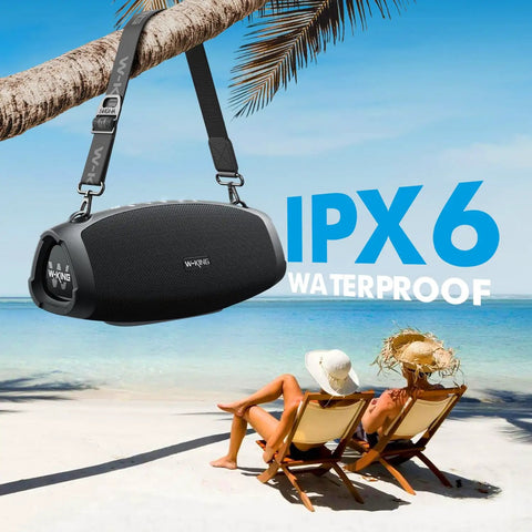 Monster Bass 120W Outdoor Bluetooth Speaker Boombox With IPX6 Waterproof Build hanging from palm tree on beach