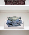 Straight Up Game Changer Plastic Drawer Storage Basket For Clothes Towels And Blankets A Real Slick Closet Organizer Bin with stacked jeans.