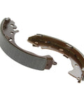 Centric Premium rear drum brake shoe set, two brown metal shoes with dark grey friction material