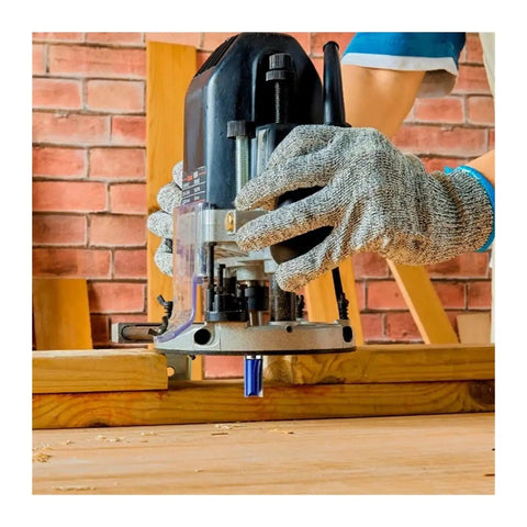 Get Ready For A Flawless Finish With This 4 Pcs Flush Trim Router Bit Set in use on wood, featuring visible router bit and gloves.