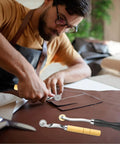 Man using Two Pack Tracing Wheel Set With Wooden Handles Pro Perforator Tools For Sewing Patterns Arts And Leather Crafts Durable Metal Wheels