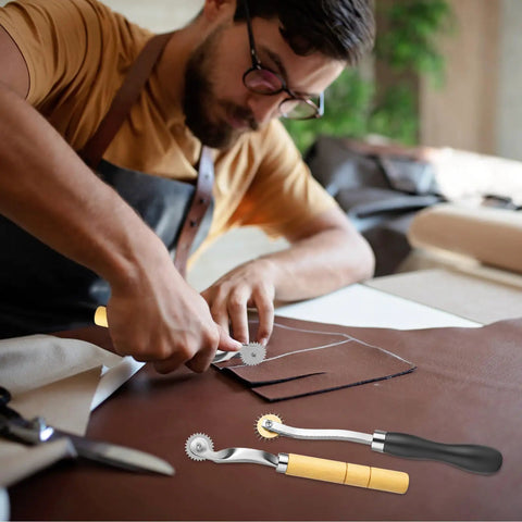 Man using Two Pack Tracing Wheel Set With Wooden Handles Pro Perforator Tools For Sewing Patterns Arts And Leather Crafts Durable Metal Wheels