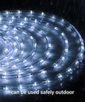 100ft Outdoor Rope Lights Waterproof String Lighting illuminates in rain, highlighting garden and backyard ambience with easy install.