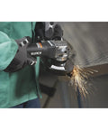 No Nonsense 4 1/2 Inch Air Angle Grinder Cranking 12000 RPM Tough Power lightweight design with sparks during use.