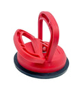 Double Handle Car Dent Lifter With Locking Suction Plate 4 Inch Diameter Vacuum Dent Puller, close-up of red tool.