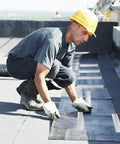Worker applying Two Rolls Heavy Duty Aluminum Foil Tape Heat Shield Reflective Barrier for high temp sealing on rooftop