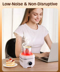 Keep Your Daily Brew Straight Fire Hot Or Perfectly Chilled With This 2 In 1 Electric Mug Warmer And Cooler Stand at a desk with coffee.