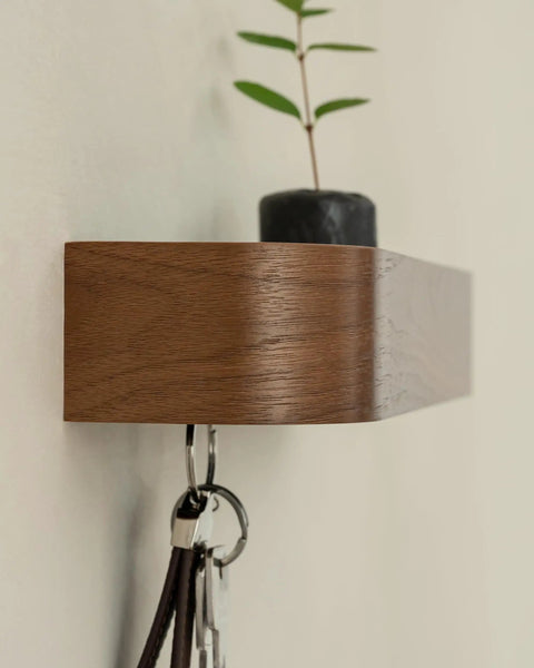 Side view of Walnut Wall Mounted Key Holder With Wooden Shelf, Minimalist Modern Key Rack For Entryway Organizer with hidden hooks and plant