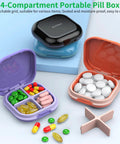 Portable 4 Compartment Pill Organizer with vitamins and tablets in colored cases, compact design for purse or pocket travel.