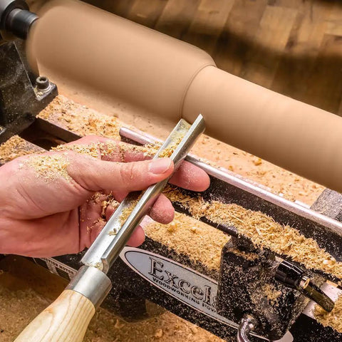 Person using 3/4 Inch Spindle Roughing Gouge For Wood Lathe Pro Grade Premium Austrian High Speed Steel on a wood lathe