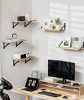 Heavy Duty Steel Wall Mount Shelf Brackets 4x3 Inch Black L Brackets with wooden shelves displaying decor and tech.