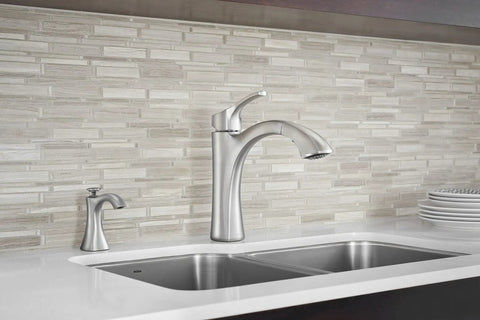 Modern kitchen with Dope Chrome Kitchen Soap Dispenser, Deck Mounted With Above-Sink Refillable 18 Oz Bottle next to sleek faucet.