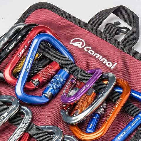 Climbing Quickdraw Hanging Storage Bag With Carabiner Hook Organizer, colorful carabiners on maroon nylon material.