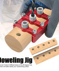 3-In-1 Doweling Jig With Hole Drill Guide And 90 Degree Positioner Locator Tool in use on wooden block, red aluminum alloy material