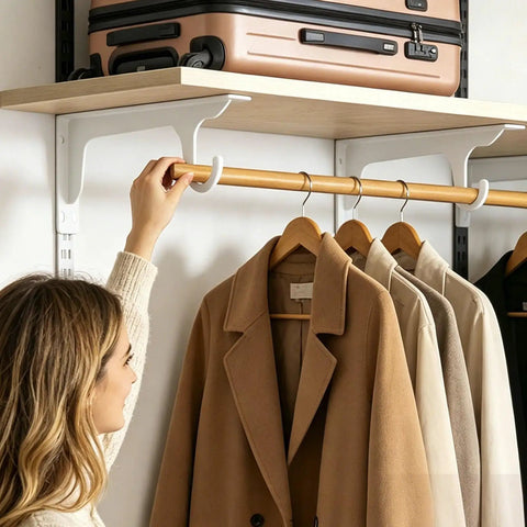 Woman organizing coats on Sturdy Closet Rod Brackets For Wall Mount Fits One Point Three To One Point Five Inch Rods Black Metal Shelf Supports