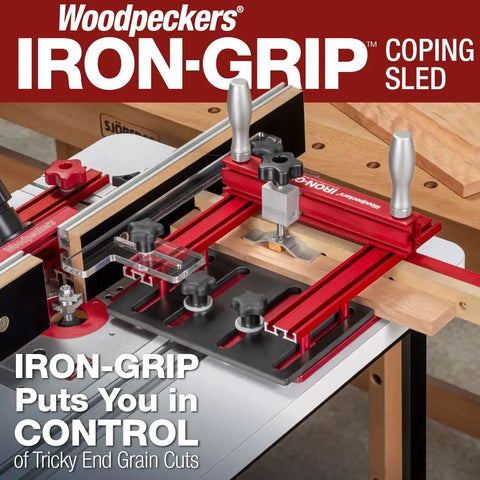 Iron Grip Coping Sled on router table, red anodized base, featuring large fence guide and rugged clamp, precision woodworking tool