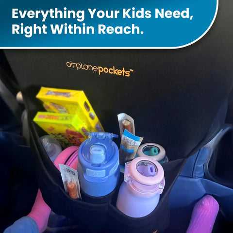 Seat back organizer with snacks and bottles, Air Travel Tray Cover And Seat Back Organizer For Flights, in airplane seat.