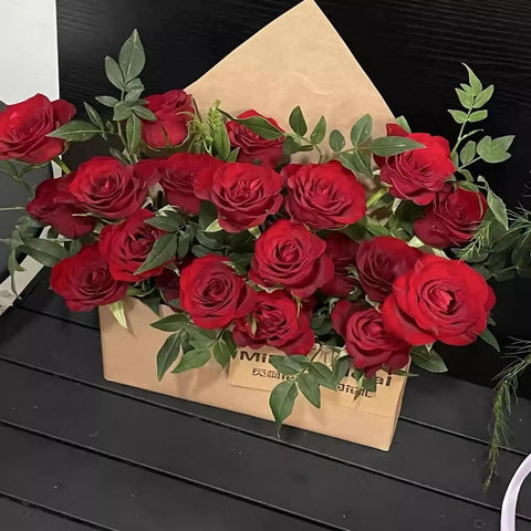 Five Pack Envelope Style Gift Boxes For Flowers And Crafting Parties displaying red roses in cardboard