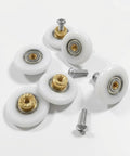 25Mm 304 Stainless Steel Shower Door Rollers For Sliding Doors Replacement Wheel Set With POM Bearings Durable Bathroom Track Wheels Smooth Quiet Operation Includes 6 Pieces Ideal For Glass And Metal Shower Enclosures And Retrofit Projects image showing six white wheels with brass cores and screws on a white background.
