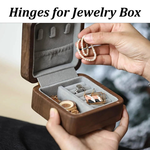 Hands holding open jewelry box with hidden hinges, showcasing brass barrel hinge set for a clean seamless look in DIY projects.