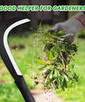 Gardener using Tough As Nails Sickle Machete for yard work with carbon steel blade, 14 inch short machete for clearing brush and weeds.