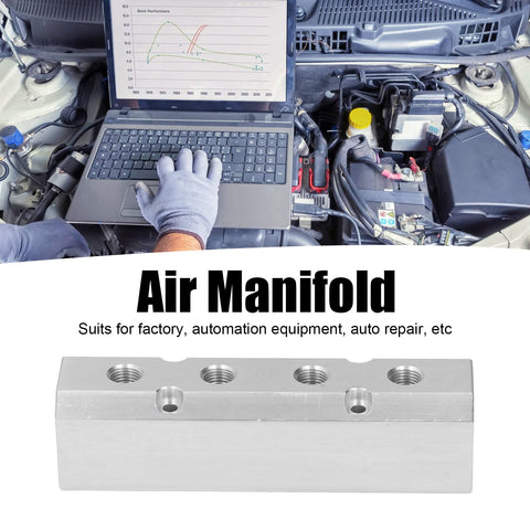 Mechanic using laptop for diagnostics next to Aluminum Pneumatic Manifold Block 40x40mm With G1/2 Inlet And G1/4 Outlets