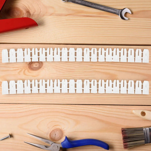Heavy Duty Drywall Anchors Kit 300 Pcs Plastic Wall Expansion Anchors on wood surface with tools.